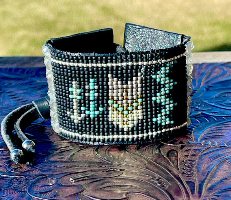 Story Teller Cuff Bracelet; Black Raven