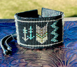 Story Teller Cuff Bracelet; Black Raven