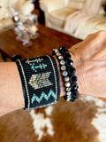 Story Teller Cuff Bracelet; Black Raven